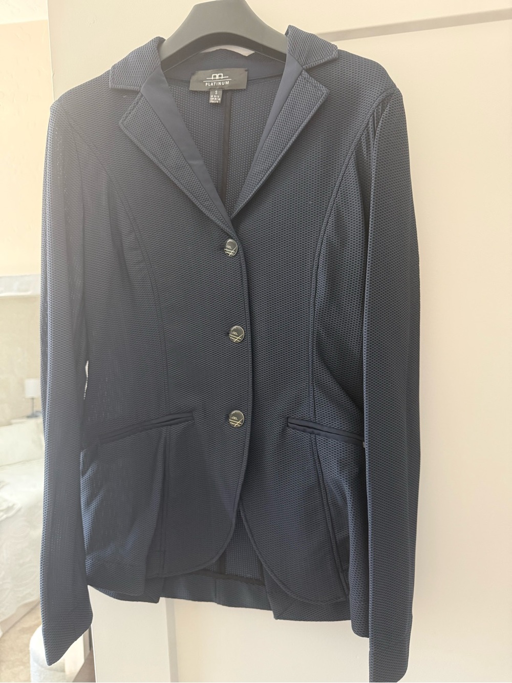 Women’s Alessandro Albanese Platinum mesh horse show riding jacket.